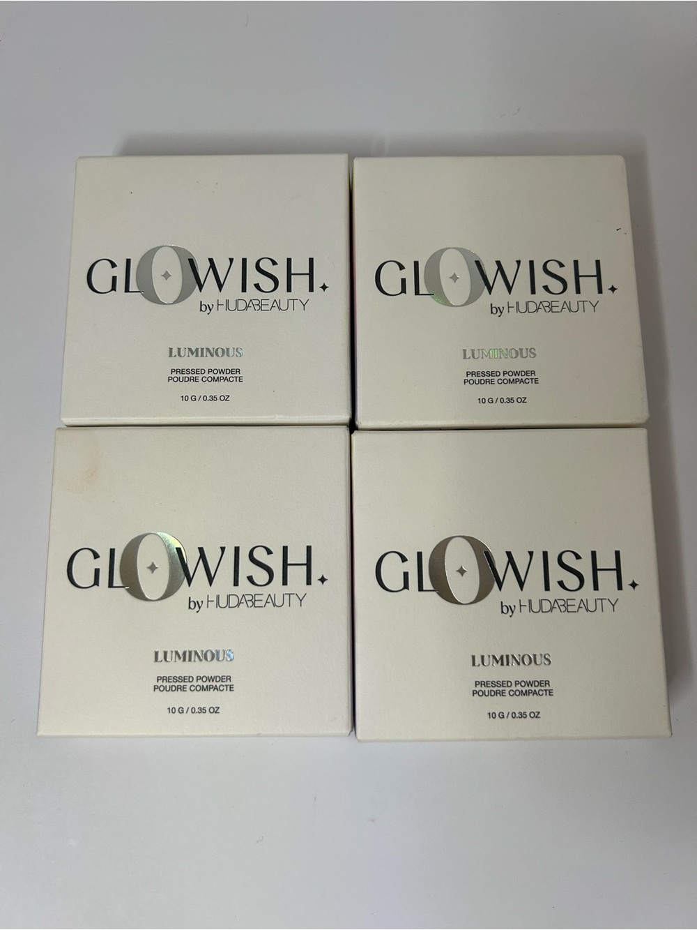 New Huda Beauty GloWish Luminous Pressed Powder 13 Extra Rich Lot Of 4. New in